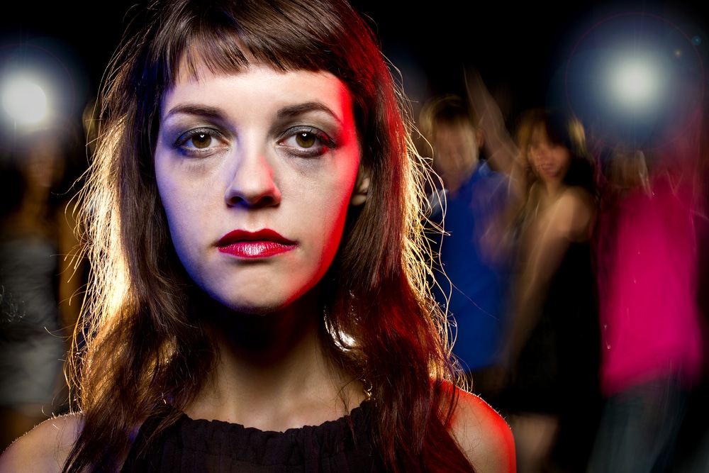 drunk female on drugs at nightclub